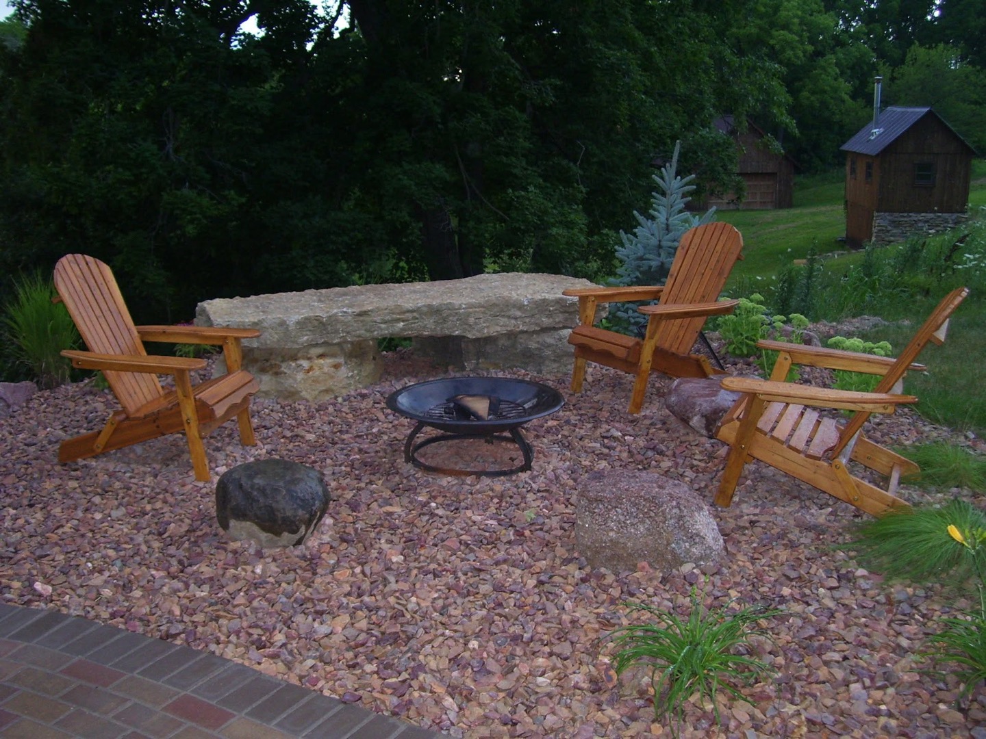 Fire pit seating area with Adirondack chairs